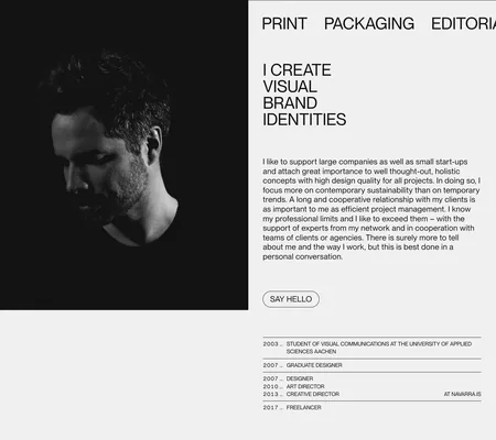 A black-and-white portrait of the designer on the left; on the right "I CREATE VISUAL BRAND IDENTITIES", a paragraph about his way of working, a "SAY HELLO" button and a CV — 2003 student in Aachen, 2007 designer, 2010 art director, 2013 creative director at Navarra.is, 2017 freelancer