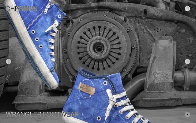The Wrangler Footwear project page hero: two blue canvas high-tops on a rusted engine block shot in black and white, "CHRRMNN" top left and "WRANGLER FOOTWEAR" along the bottom, both reversed out of the photograph