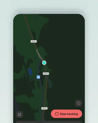The dashboard in dark mode on a phone: the same valley road on a near-black map, a teal position dot and the red Stop tracking button